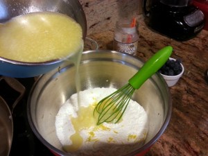 adding wet ingredients to dry