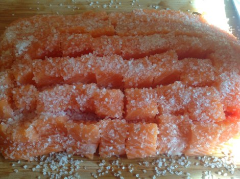 Sprinkle salmon with a generous amount of either kosher or sea salt., and let marinate for 10 minutes